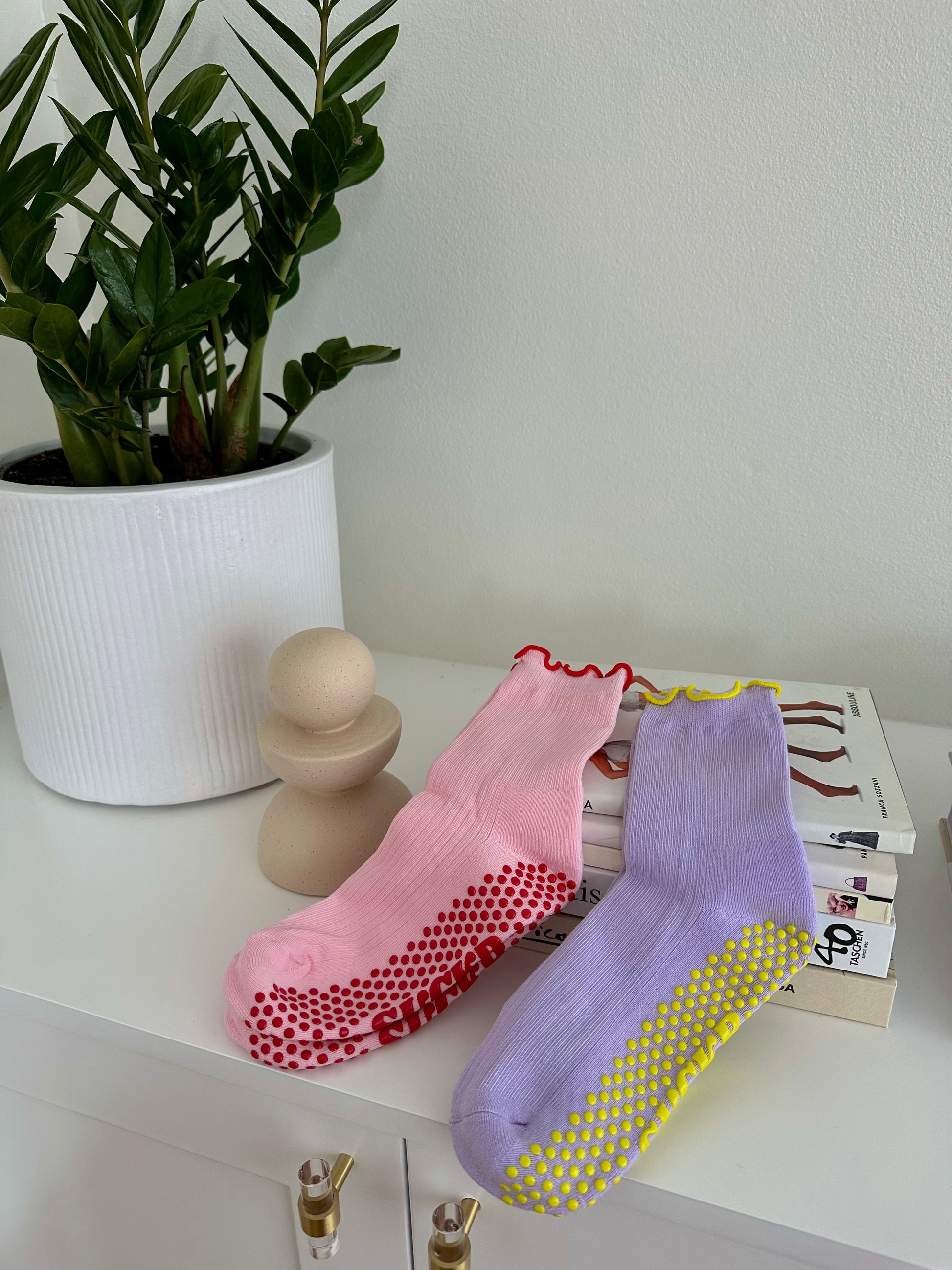 SUCKR princess frill purple and pink grip socks, front of product