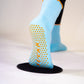 SUCKR  blue frill grip socks, bottom of sole