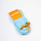 SUCKR  blue frill grip socks, packet photo