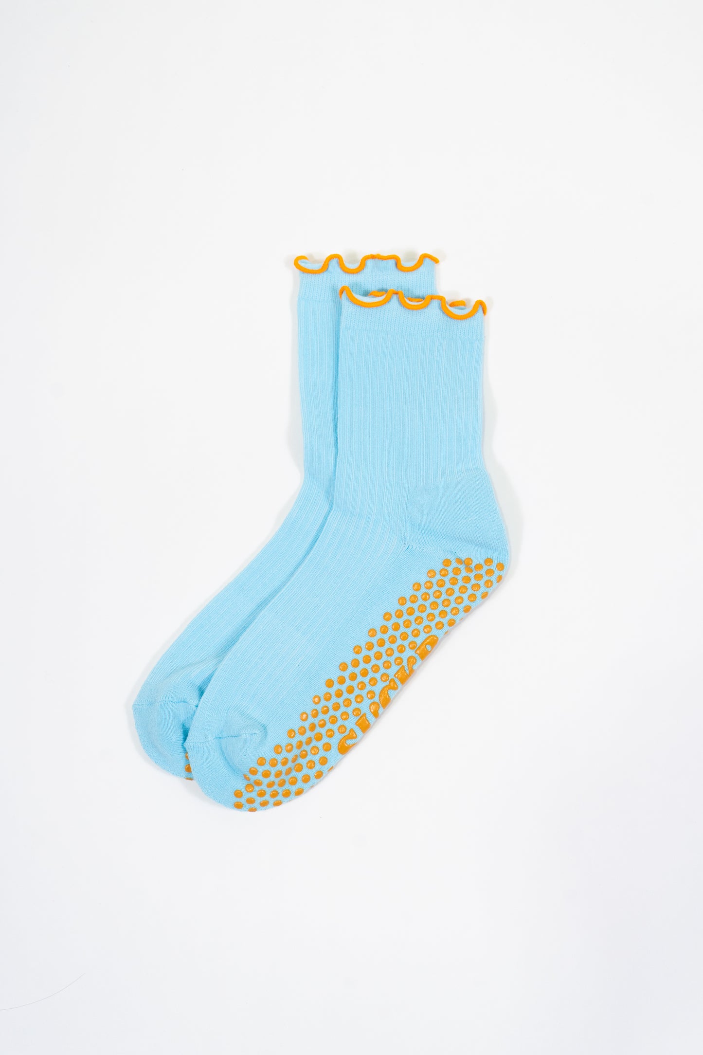 SUCKR  blue frill grip socks, front photo
