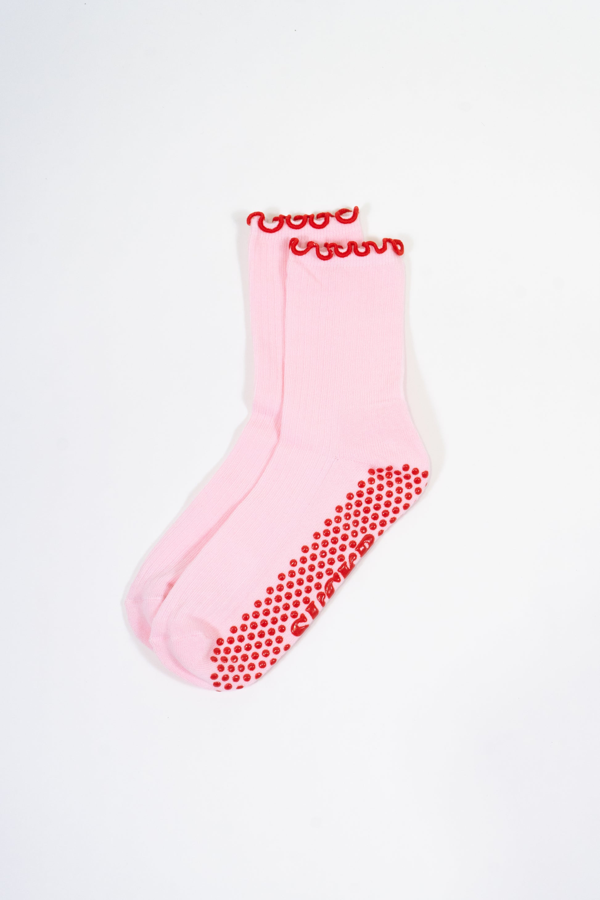 SUCKR Pink frill grip socks, front side
